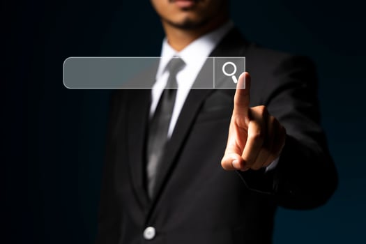 Fingers touching search button with magnifying glass, searching engine icon. photo