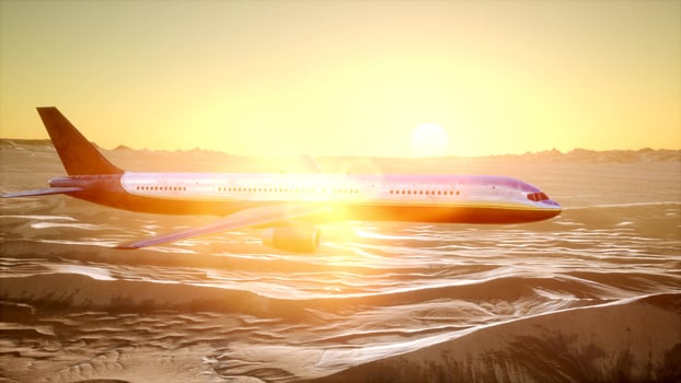 view to the airplane over the desert photo
