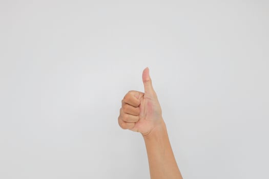 Hand tumb sign. Isolated on white background photo