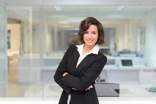 Business woman in a office. Crossed arms photo