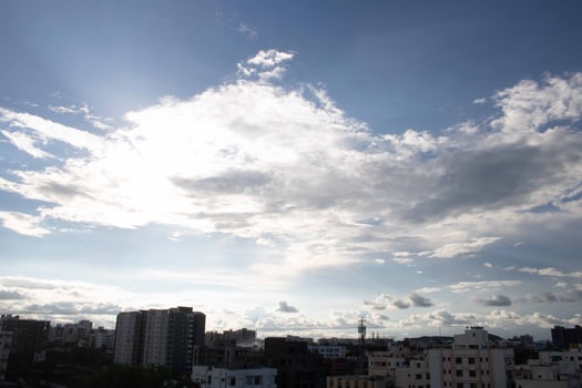 Air clouds in the blue sky photo