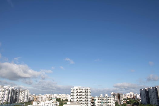 Air clouds in the blue sky photo