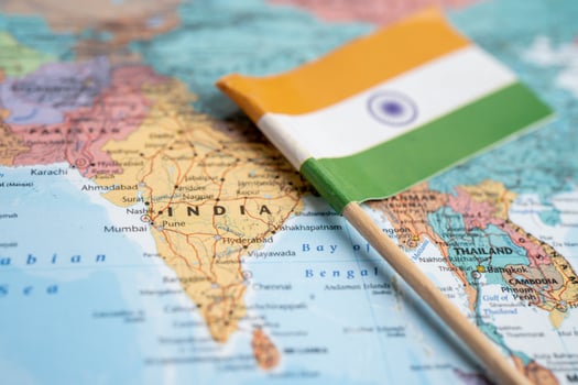 Bangkok, Thailand - June 1, 2021, India flag on world globe map background. photo