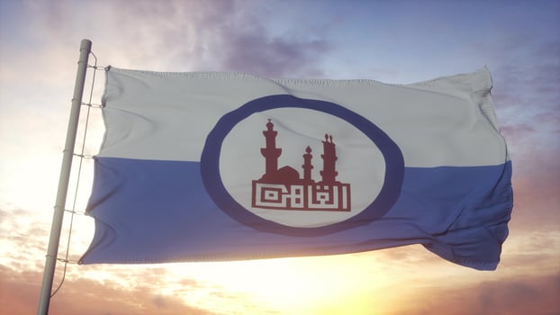 Cairo flag, Egypt, waving in the wind, sky and sun background. 3d rendering photo