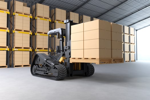 Forklift truck is lifting a pallet with cardboard boxes photo