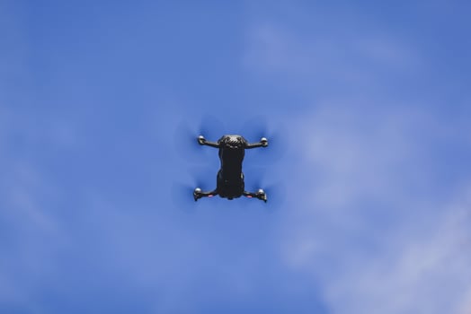 Small drone over sky photo