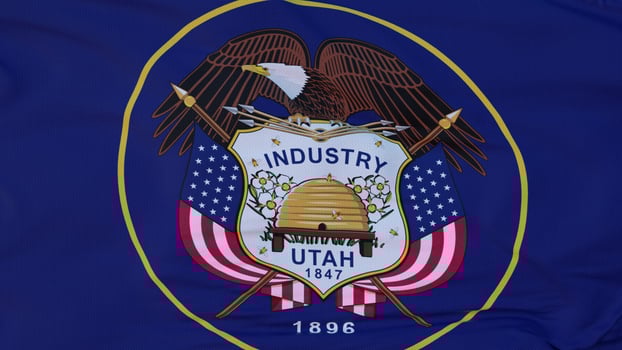 Flag of Utah state, region of the United States, waving at wind. 3d rendering photo
