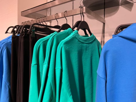 clothing store. things on a hanger in a store. wardrobe woman. sale mall photo