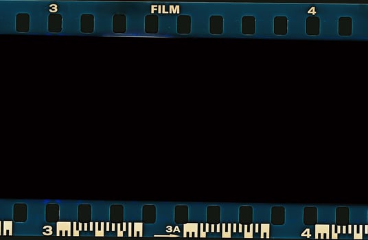 35mm film frames strip scanned with signs of usage on bezel. photo