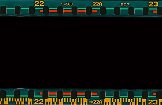 35mm film frames strip scanned with signs of usage on bezel. photo