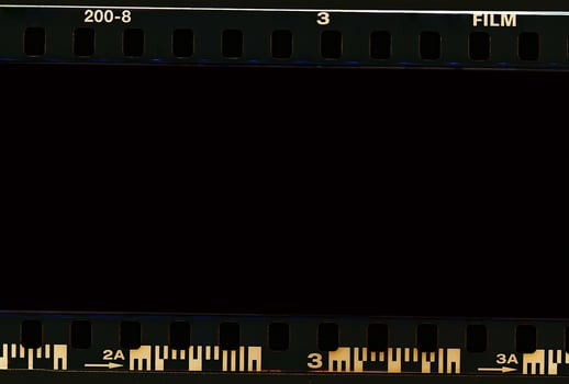 35mm film frames strip scanned with signs of usage on bezel. photo