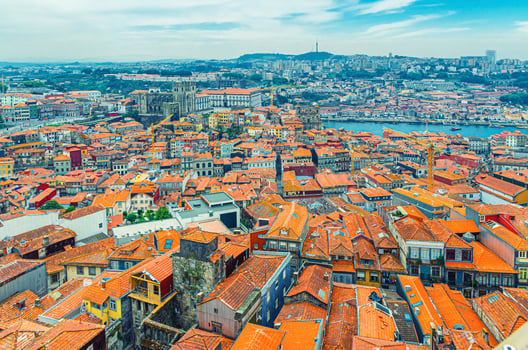 Aerial panoramic view of Porto Oporto city historical centre with red tiled roof typical buildings photo