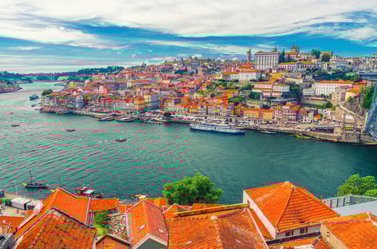 Aerial panoramic view of Porto Oporto city historical centre with Ribeira district colorful buildings houses on embankment of Douro River photo