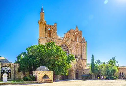 Lala Mustafa Pasha Camii Mosque or Old Cathedral of Saint Nicholas medieval building with minaret in Famagusta photo