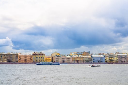 Cityscape of Saint Petersburg Leningrad city with row of old colorful buildings on embankment photo