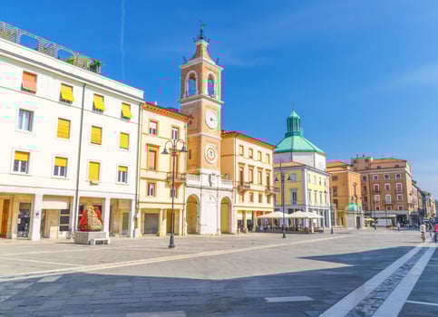 Piazza Tre Martiri Three Martyrs square with traditional buildings with clock and bell tower photo