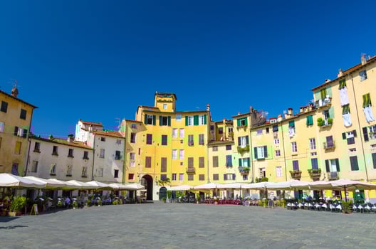 Piazza dell Anfiteatro square in circus yard of medieval town Lucca historical centre photo