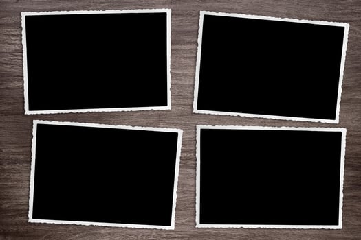 four old vintage photos on wooden background