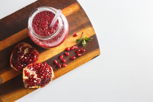 freshly prepared smoothies from banana and pomegranate. Diet, a healthy lifestyle photo