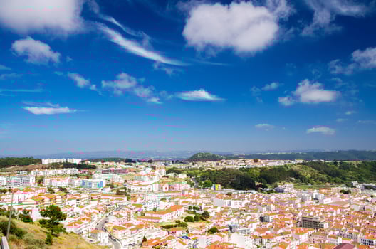 Portugal, panoramic view of the centre of Nazare city, red roof of Nazare photo