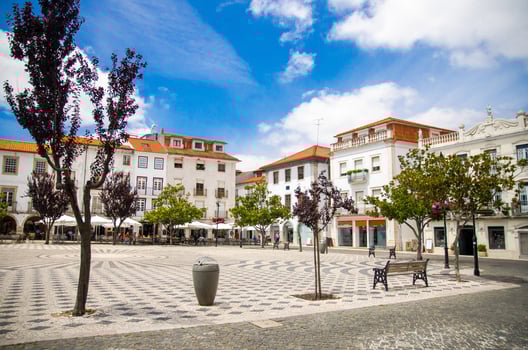 Portugal, view of the main square of the old town Leiria with red tile of roofs photo