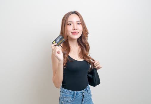 portrait beautiful Asian woman holding credit card photo