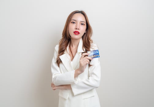 portrait beautiful Asian woman holding credit card photo