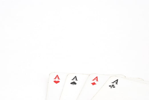 playing cards four ace from deck full view on white background photo