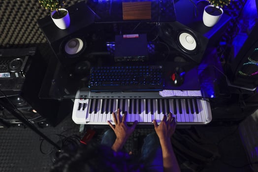 Piano players were recording in the recording studio photo