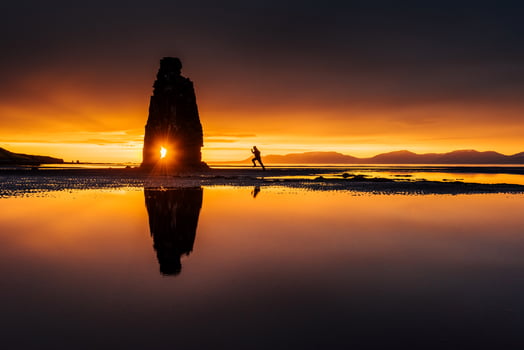 Hvitserkur 15 m height. Is a spectacular rock in the sea on the Northern coast of Iceland.  this photo  reflects in the  water after the midnight sunset.