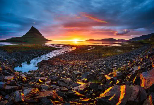 The picturesque sunset over landscapes and waterfalls. Kirkjufell mountain Iceland photo