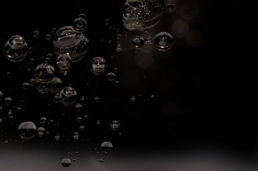 oil droplets on black photo