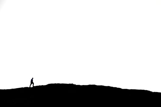 man on mountain photo