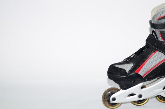 rollerskates on white right photo
