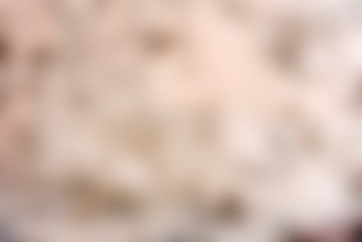 Texture of a concrete wall with cracks and scratches which can be used as a background photo