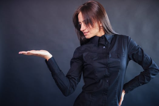 Portrait of beautiful smart young businesswoman in business attire photo