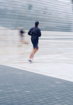 man runnig in Bilbao city, Spain photo