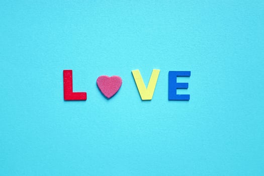 love word on the blue background for valentine's day photo