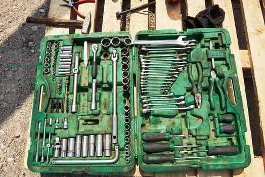 a lot of old instruments in tool box photo