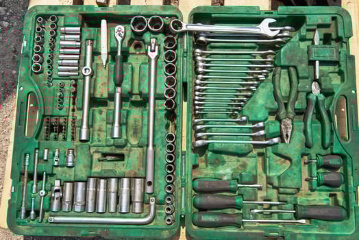a lot of old instruments in tool box photo