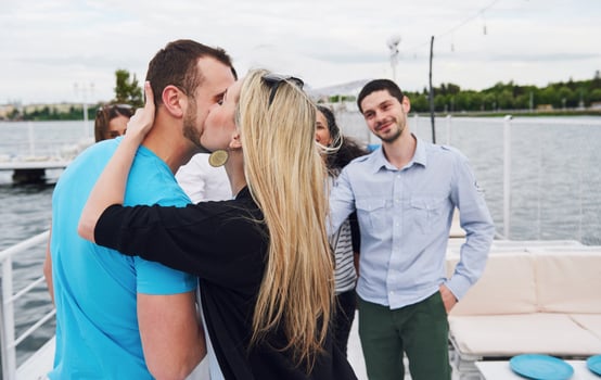 girl congratulates her boyfriend on his birthday. photo