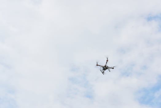 drone quad copter with high resolution digital camera on the sky photo