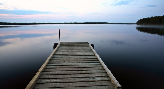 Boat dock at Smallfish Lake in scenic Saskatchewan photo