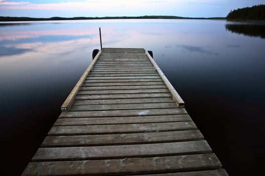 Boat dock at Smallfish Lake in scenic Saskatchewan photo