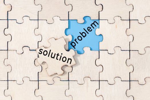 Solution to the problem concept. Puzzle with text photo