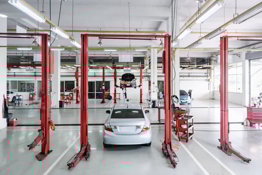 Car Auto Service and Vehicle Maintenance Workshop Center, Automobile Garage Shop and Spare Part Changing. Automotive Services Station. Business Car Repair and Check Up photo