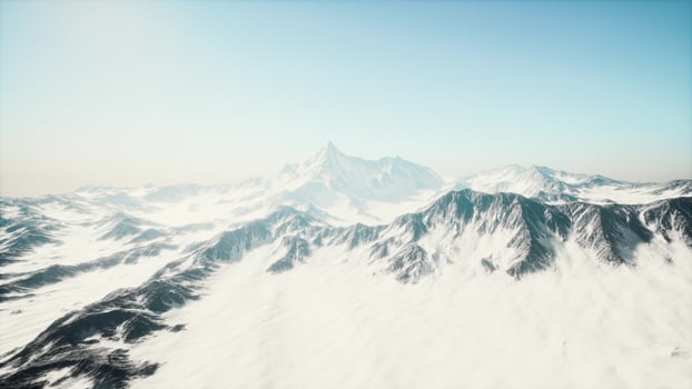Panoramic view of the ski slope with the mountains photo