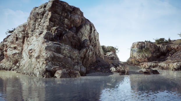 rocky tropical island in ocean photo