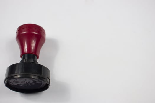 a black stamp on a white background photo