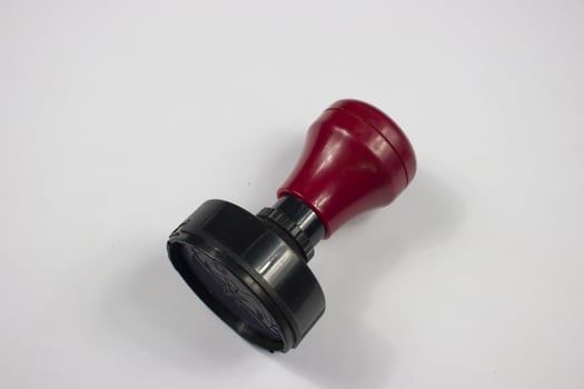a black stamp on a white background photo